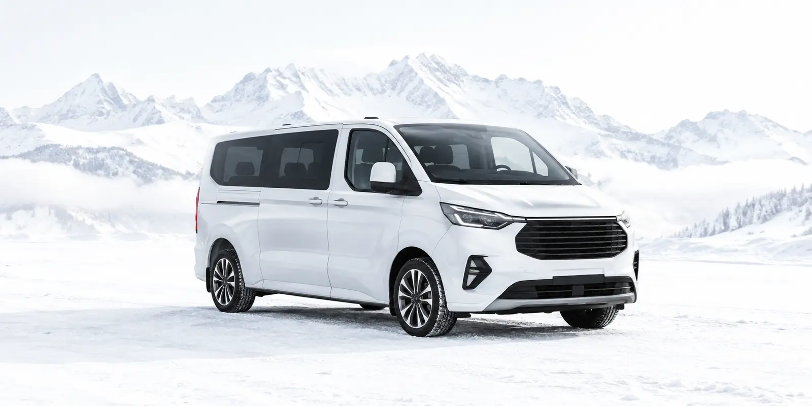 Modern private airport transfer minibus in the Alps